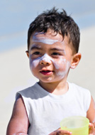 Children are most at risk and studies show early sun exposure, especially sunburn during childhood, appears to increase the risk of melanoma later in life.
